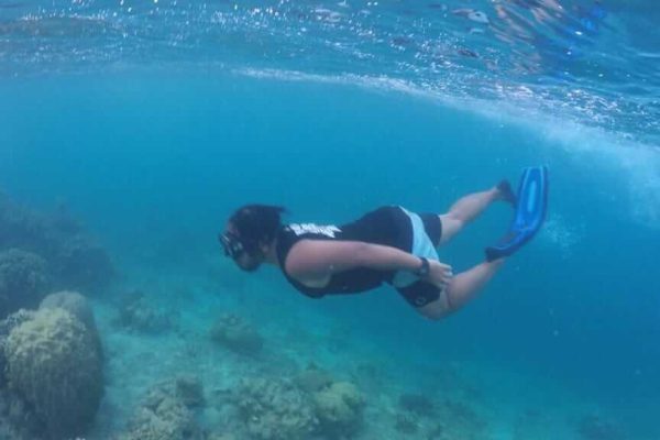 north-seymour-tourists-snorkeling-in-galapagos-islands-archipelago